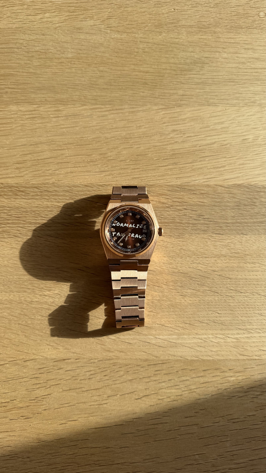 NORMALIZE TAX FRAUD Rose Gold automatic watch
