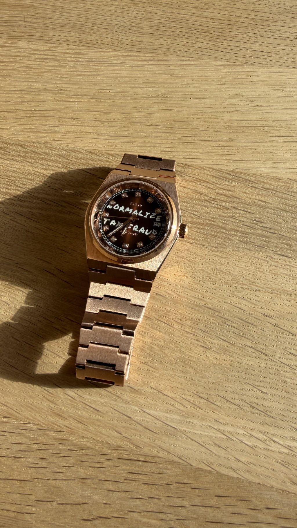 NORMALIZE TAX FRAUD Rose Gold automatic watch