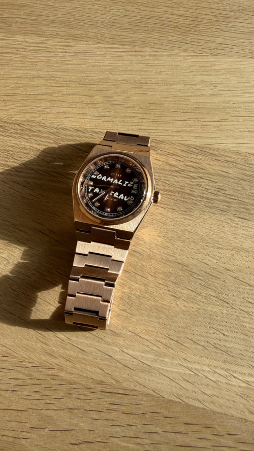 NORMALIZE TAX FRAUD Rose Gold automatic watch