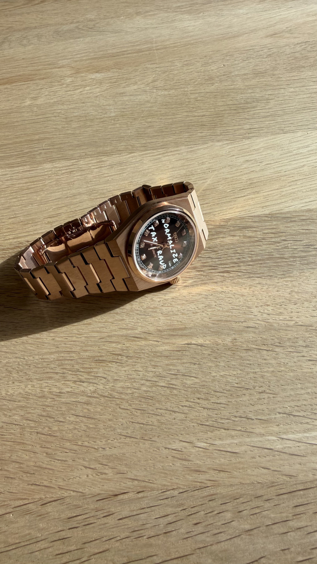 NORMALIZE TAX FRAUD Rose Gold automatic watch