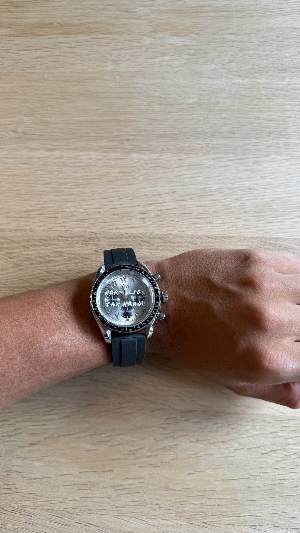 NORMALIZE TAX FRAUD Steel Chronograph watch on wrist